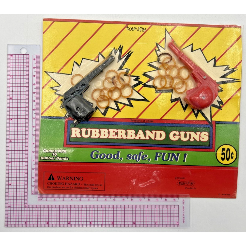 Vintage Vending‎ Display Board Rubberband Gun 0087